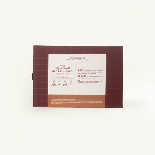 A rectangular brown cardboard box with a white front label, photographed against a clean white background. The label reads 'LUXE MIXER CUBE' and 'OLD FASHIONED', with small instructional line drawings and text below.