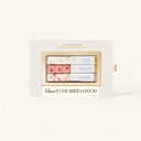 A gift box containing Luxe Mixer Cubes for making specialty drinks, featuring three flavors: Peach Bellini, Strawberry Bellini, and Raspberry Bellini, with a "Cheers to the Bride & Groom" label.