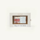 A white gift box labeled Cheers to the Bride contains three rows of assorted Luxe Mixer Cubes in different flavors. The box has a clear window showing the colorful cubes inside.