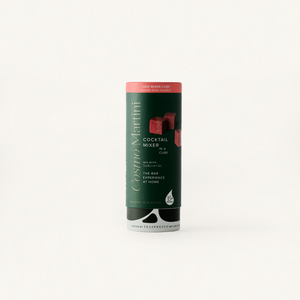 Cosmo Luxe Mixer Cube Tallboy in dark green cylindical packaging.