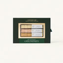 A green gift box containing Luxe Mixer Cubes for making specialty drinks, featuring three flavors: Manhattan, Old Fashioned and Kentucky Mule with a "Will you be my Groomsman" label.