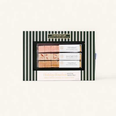 Packaged set of Luxe Mixer Cube specialty drinks mixers with striped design on a white background