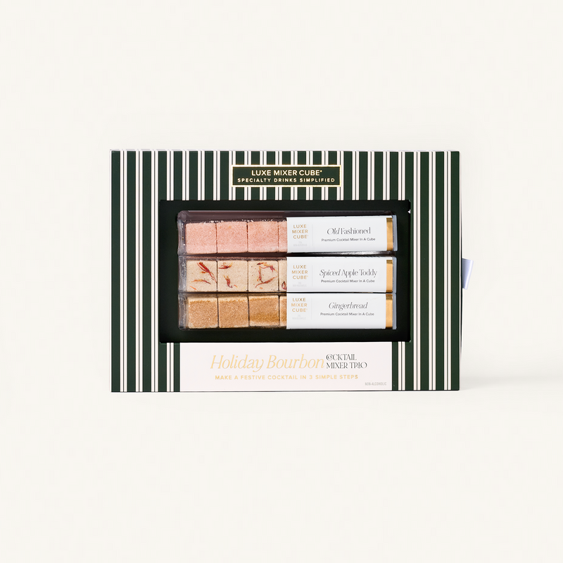 Packaged set of Luxe Mixer Cube specialty drinks mixers with striped design on a white background