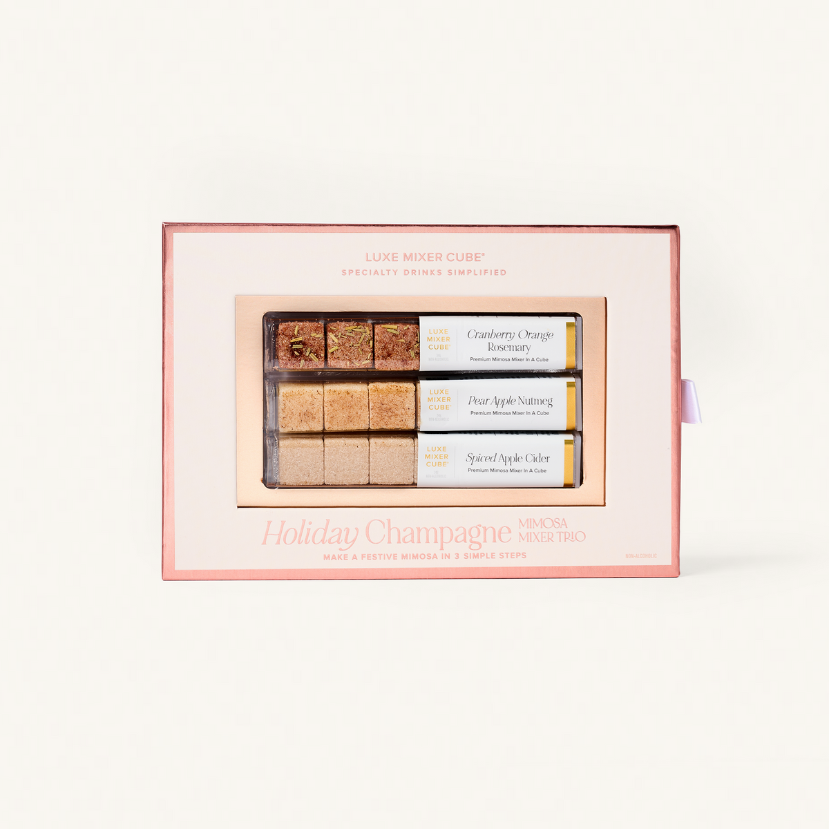 Set of holiday-themed soap bars in a decorative box on a white background
