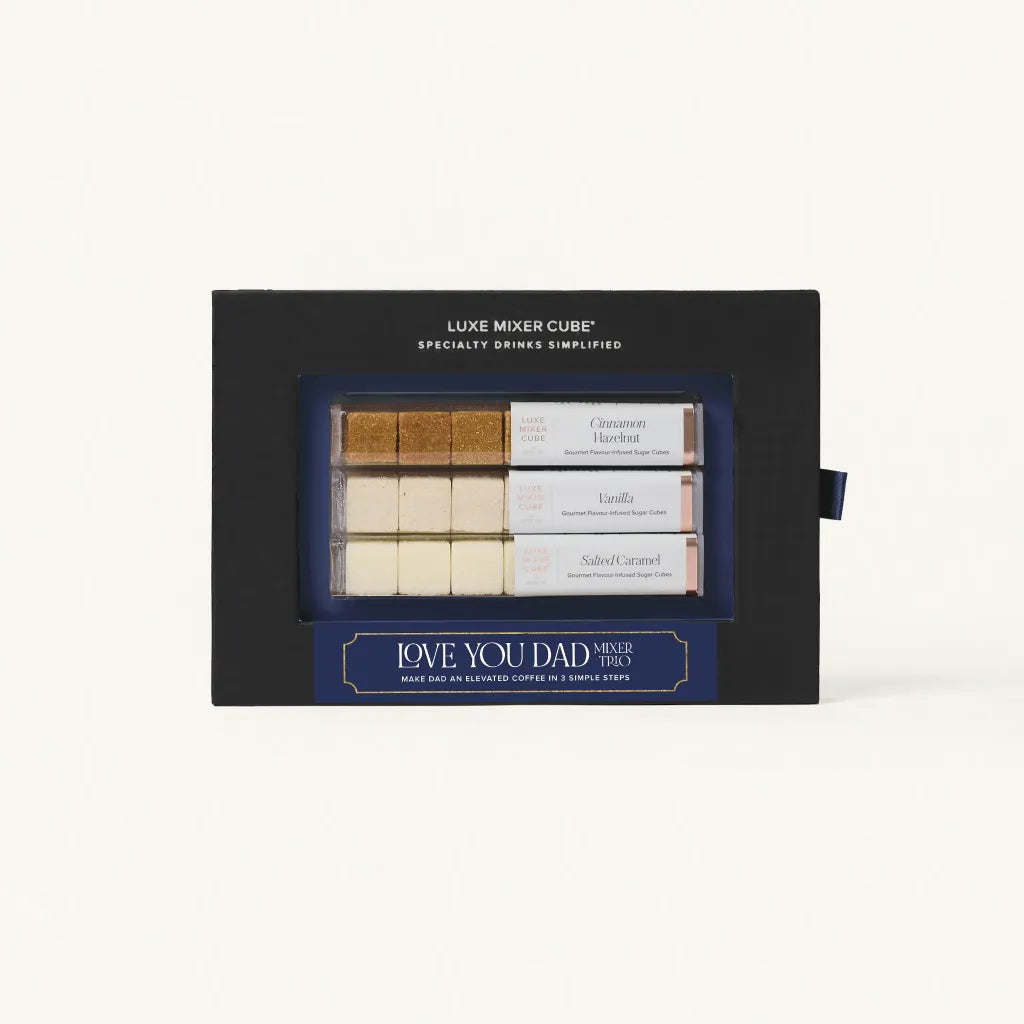 Luxe Mixer Cube gift set with three small tubes and a black box on a white background