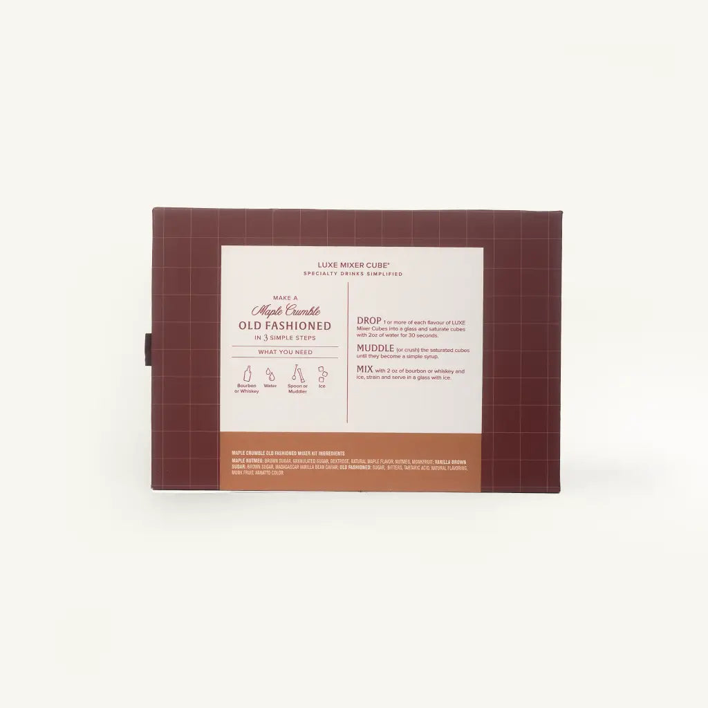 A rectangular brown cardboard box with a white front label, photographed against a clean white background. The label reads 'LUXE MIXER CUBE' and 'OLD FASHIONED', with small instructional line drawings and text below.