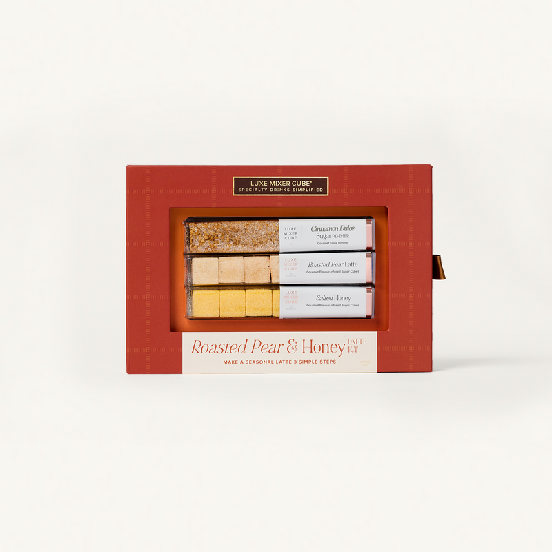 Red gift box with 'Luxe Mixer Cube' branding containing roasted pear and honey treats.
