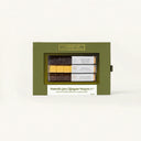 Chocolate bars in a green box with visible brand name on a white background