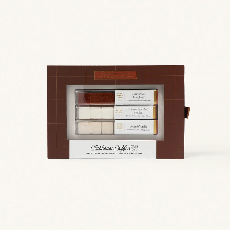 Clubhouse Coffee Café Set in a brown box packaging featuring gourmet Cinnamon Hazelnut, Sugar, and French Vanilla coffee mixer cubes.